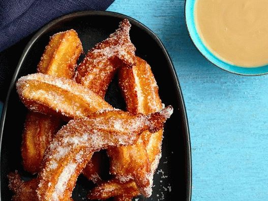 Foto de Churros com molho de coco (rosquinhas de massa de creme)
