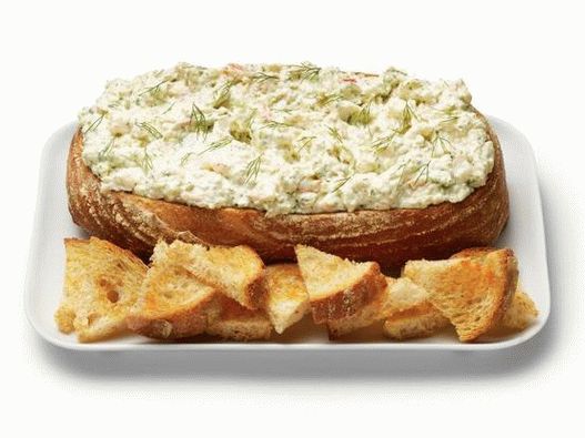 Photo dip sauce Deusa verde com camarão em uma tigela de pão