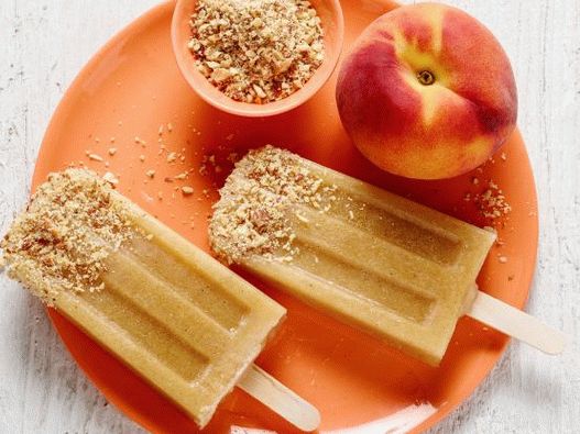 Photo Fruit gelo com pêssego e amêndoas grelhadas