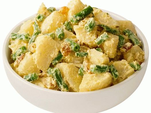 Foto salada de batata com feijão verde e curry