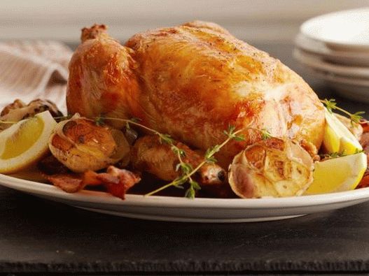 Foto frango assado com limão e alho
