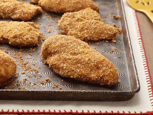 Foto de um frango crocante assado no forno