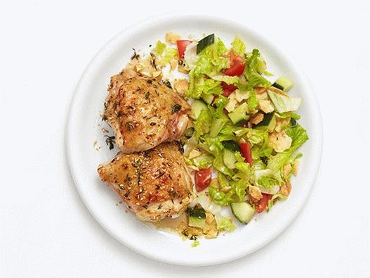 Foto Coxas de frango com sementes de gergelim e limão