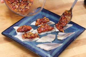 Arenque picante com queijo