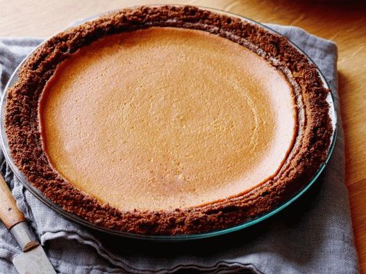 Foto Abóbora aberta com bolo de gengibre