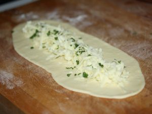 Pide com queijo de cabra