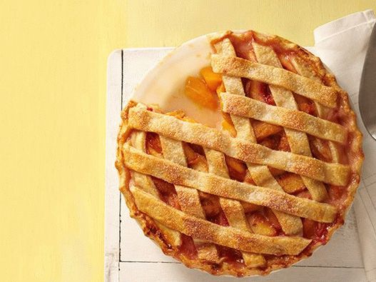 Photo Peach pie de uma forma rústica