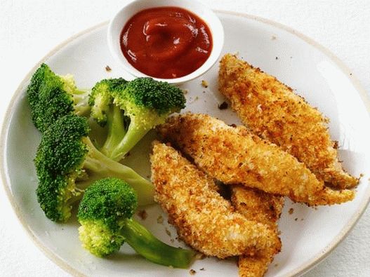 Frango empanado com acompanhamento de brócolis a vapor