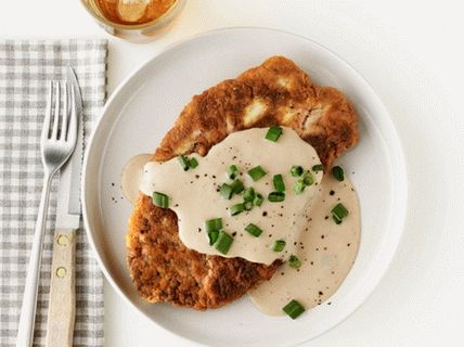 Foto de bife de alcatra com molho bechamel