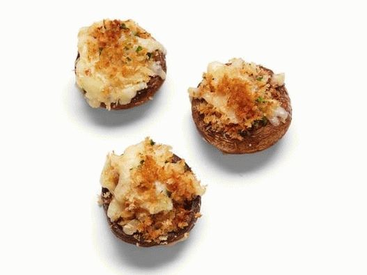 Foto fondue de queijo em tampas de cogumelos