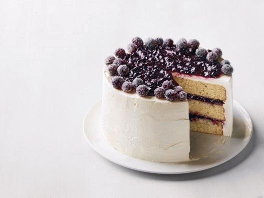 Photo Puff bolo com uma camada de geléia de maçã e cobertura de uvas de açúcar