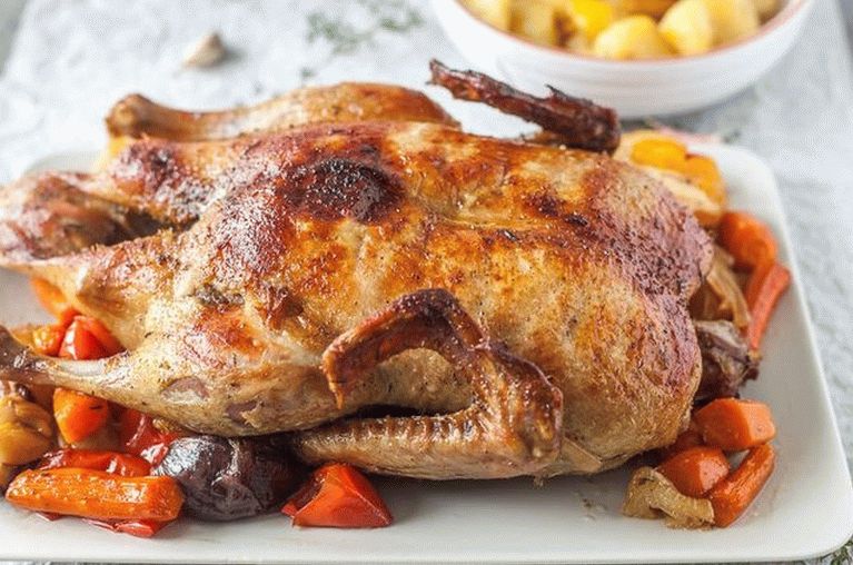 Pato com legumes no forno